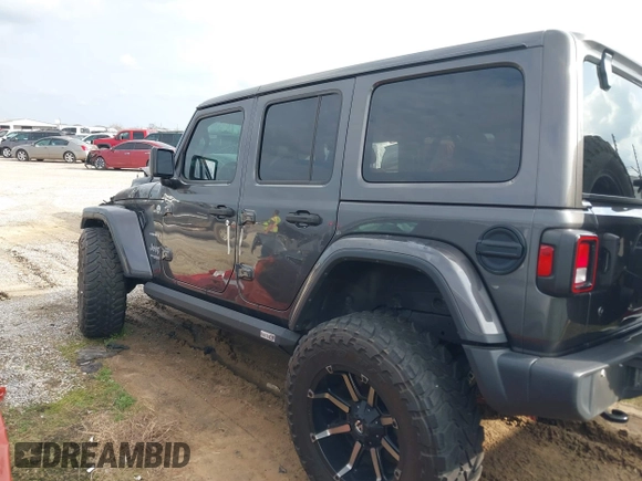 2019 Jeep Wrangler Unlimited Sahara with VIN 1C4HJXEG7KW661801, listed as a IAAI auction lot 40848731 with Not provided miles and . Bid and sale history available at DreamBid. Image 13.