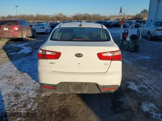 2014 Kia Rio LX with VIN KNADM4A39E6415521, listed as a IAAI auction lot 41411105 with 134,882 mi miles. Bid and sale history available at carsss.com. Image 17.