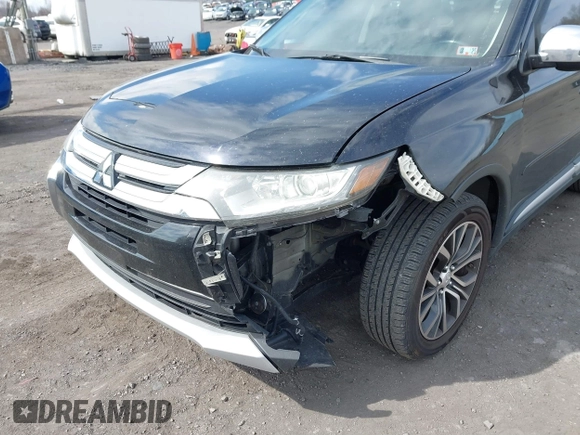 2016 Mitsubishi Outlander SE with VIN JA4AD3A39GZ003885, listed as a IAAI auction lot 41869646 with 193,320 mi miles and . Bid and sale history available at DreamBid. Image 6.