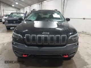 2022 Jeep Cherokee Trailhawk with VIN 1C4PJMBX8ND517236, listed as a IAAI auction lot 41530369 with 34,164 mi miles and . Bid and sale history available at DreamBid. Image 12.
