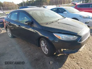 2015 Ford Focus SE with VIN 1FADP3F29FL210973, listed as a IAAI auction lot 41874367 with 128,705 mi miles. Bid and sale history available at carsss.com. Image 1.