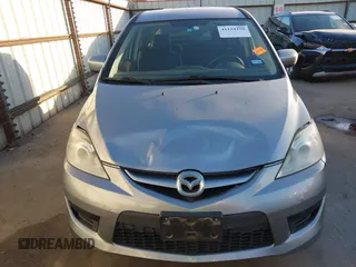 2010 Mazda 5 Sport z VIN JM1CR2W30A0384041, wystawiony jako IAAI lot #41134158 z przebiegiem 178 540 mil mil oraz . Historia ofert i sprzedaży dostępna na DreamBid. Obrazek 6.