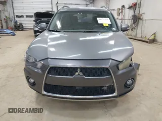 2011 Mitsubishi Outlander SE z VIN JA4JT3AWXBU007978, wystawiony jako IAAI lot #42337365 z przebiegiem 239 587 mil mil oraz . Historia ofert i sprzedaży dostępna na DreamBid. Obrazek 12.