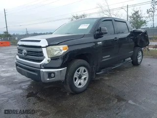 2014 Toyota Tundra 4WD Truck SR5 with VIN 5TFDW5F10EX395339, listed as a IAAI auction lot 41654654 with 238,745 mi miles. Bid and sale history available at carsss.com. Image 17.