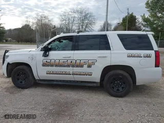 2020 Chevrolet Tahoe Commercial with VIN 1GNLCDEC7LR199179, listed as a IAAI auction lot 41502623 with 87,271 mi miles. Bid and sale history available at carsss.com. Image 14.