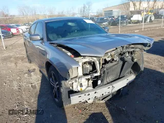 2014 Dodge Charger RT Plus with VIN 2C3CDXDT1EH124140, listed as a IAAI auction lot 41876248 with 127,399 mi miles. Bid and sale history available at carsss.com. Image 1.