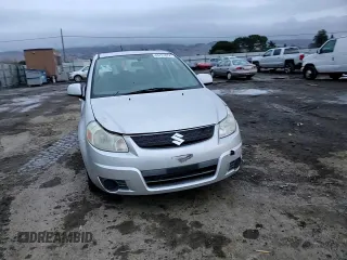 2007 Suzuki SX4 with VIN JS2YA411775100842, listed as a Copart auction lot 84701624 with 131,717 mi miles and Salvage Title. Bid and sale history available at carsss.com. Image 10.