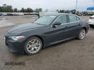 2018 Alfa Romeo Giulia Ti Lusso z VIN ZARFAEEN7J7591242, wystawiony jako Copart lot #76431503 z przebiegiem 64 000 mil mil oraz Nie do naprawy. Historia ofert i sprzedaży dostępna na DreamBid. Obrazek 1.