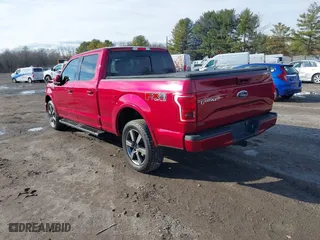 2015 Ford F-150 XLT w/HD Payload Pkg with VIN 1FTFW1EF2FFB76243, listed as a IAAI auction lot 41150866 with 124,478 mi miles. Bid and sale history available at carsss.com. Image 3.