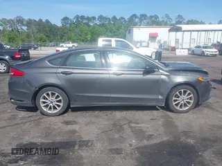2017 Ford Fusion SE z VIN 3FA6P0H76HR259097, wystawiony jako IAAI lot #42133090 z przebiegiem 187 400 mil mil oraz . Historia ofert i sprzedaży dostępna na DreamBid. Obrazek 13.
