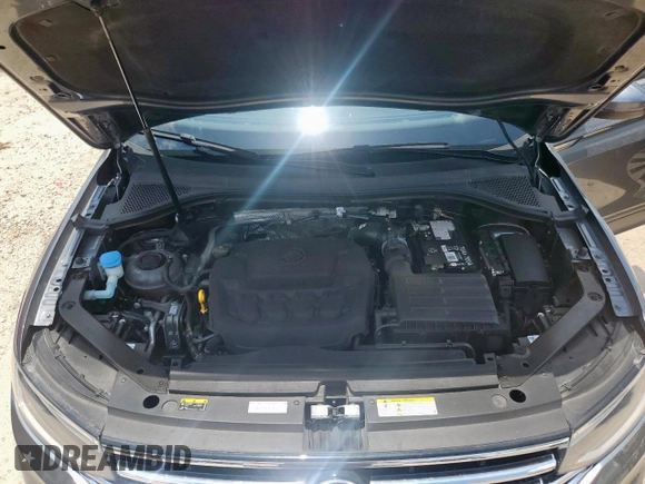 2024 Volkswagen Tiguan SE with VIN 3VV3B7AX4RM061942, listed as a Copart auction lot 61206695 with 27,128 mi miles and Salvage title. Bid and sale history available at DreamBid. Image 12.