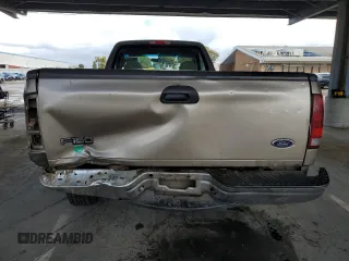 2002 Ford F-150 XL with VIN 1FTRF17W62NB40159, listed as a Copart auction lot 49010765 with 166,719 mi miles and Salvage Title. Bid and sale history available at carsss.com. Image 6.