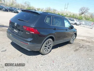 2021 Volkswagen Tiguan S with VIN 3VV0B7AXXMM040752, listed as a IAAI auction lot 41988353 with 51,757 mi miles and . Bid and sale history available at DreamBid. Image 4.