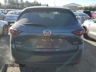 2021 Mazda CX-5 Grand Touring with VIN JM3KFBDM9M0490239, listed as a Copart auction lot 43306975 with 47,010 mi miles and Salvage Title. Bid and sale history available at carsss.com. Image 6.