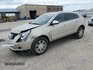 2015 Cadillac SRX Luxury Collection z VIN 3GYFNEE33FS606531, wystawiony jako Copart lot #53088485 z przebiegiem 115 140 mil mil oraz Szkody całkowita. Historia ofert i sprzedaży dostępna na DreamBid. Obrazek 1.