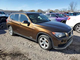 2015 BMW X1 sDrive28i with VIN WBAVM1C54FV316825, listed as a Copart auction lot 83592644 with 76,823 mi miles and Salvage Title. Bid and sale history available at carsss.com. Image 4.