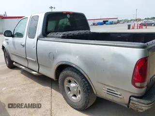 1999 Ford F-150 with VIN 1FTRX17W7XKB20640, listed as a IAAI auction lot 42273497 with 250,232 mi miles and . Bid and sale history available at DreamBid. Image 3.