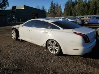 2014 Jaguar XJ with VIN SAJWJ2GD2E8V61998, listed as a Copart auction lot 42962645 with 101,609 mi miles and Salvage Title. Bid and sale history available at carsss.com. Image 2.