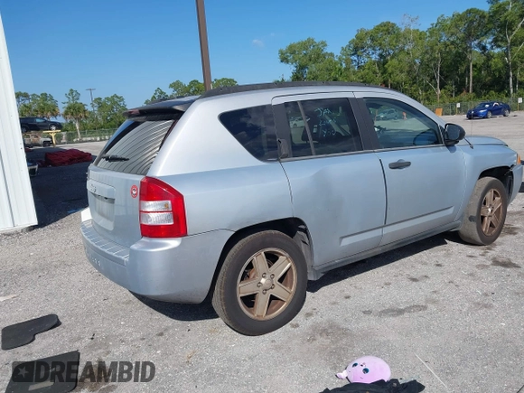 2007 Jeep Compass Sport with VIN 1J8FT47W57D185807, listed as a IAAI auction lot 41700283 with 194,339 mi miles. Bid and sale history available at carsss.com. Image 4.