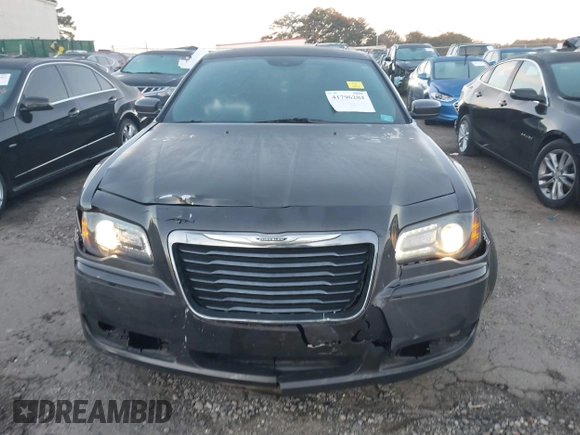 2014 Chrysler 300 S with VIN 2C3CCABG2EH352220, listed as a IAAI auction lot 41796284 with 127,070 mi miles and . Bid and sale history available at DreamBid. Image 12.