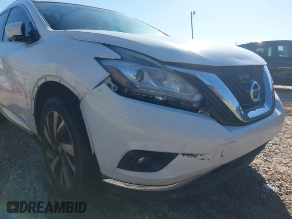 2015 Nissan Murano Platinum z VIN 5N1AZ2MG7FN265552, wystawiony jako IAAI lot #41828490 z przebiegiem 211 465 mil mil oraz . Historia ofert i sprzedaży dostępna na DreamBid. Obrazek 6.