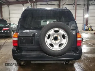 2003 Suzuki Grand Vitara z VIN JS3TD62V234100175, wystawiony jako Copart lot #47174605 z przebiegiem 88 451 mil mil oraz Szkody całkowita. Historia ofert i sprzedaży dostępna na DreamBid. Obrazek 6.