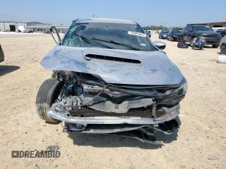 2022 Subaru WRX with VIN JF1VBAA64N9027221, listed as a Copart auction lot 56985005 with 22,787 mi miles and Salvage title. Bid and sale history available at DreamBid. Image 5.