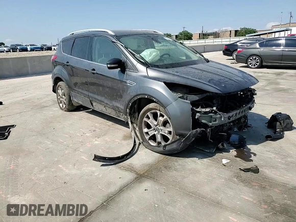 2015 Ford Escape Titanium z VIN 1FMCU0J92FUA07768, wystawiony jako Copart lot #53382545 z przebiegiem Nie podano mil oraz Szkoda całkowita • Salvage title. Historia ofert i sprzedaży dostępna na DreamBid. Obrazek 11.