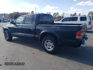 2003 Dodge Dakota SLT with VIN 1D7HL48N03S367805, listed as a Copart auction lot 82282594 with 297,571 mi miles and Salvage Title. Bid and sale history available at carsss.com. Image 2.