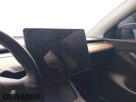 2022 Tesla Model Y Long Range z VIN 7SAYGDEE9NF331410, wystawiony jako IAAI lot #41580172 z przebiegiem 81 794 mil mil oraz . Historia ofert i sprzedaży dostępna na DreamBid. Obrazek 18.