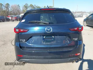 2022 Mazda CX-5 2.5 Turbo with VIN JM3KFBAY4N0534690, listed as a IAAI auction lot 41716988 with 23,910 mi miles and . Bid and sale history available at carsss.com. Image 16.