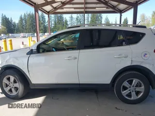 2014 Toyota RAV4 XLE with VIN JTMRFREV6EJ002755, listed as a IAAI auction lot 42021556 with 133,570 mi miles. Bid and sale history available at carsss.com. Image 14.