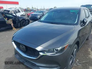 2018 Mazda CX-5 Touring with VIN JM3KFACM9J1348054, listed as a IAAI auction lot 42043458 with 120,177 mi miles. Bid and sale history available at carsss.com. Image 6.