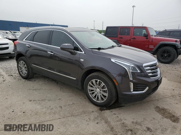 2017 Cadillac XT5 Luxury FWD with VIN 1GYKNBRS2HZ286297, listed as a Copart auction lot 60443455 with 82,505 mi miles and Clean title. Bid and sale history available at DreamBid. Image 4.