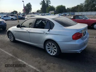 2011 BMW 3 Series 328i xDrive with VIN WBAPK7C56BA819100, listed as a Copart auction lot 66148664 with 121,601 mi miles and Salvage Title. Bid and sale history available at carsss.com. Image 2.