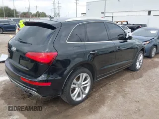 2015 Audi SQ5 Premium Plus with VIN WA1CGAFP5FA061554, listed as a IAAI auction lot 41513798 with 134,006 mi miles. Bid and sale history available at carsss.com. Image 4.