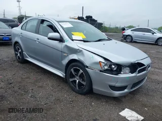 2014 Mitsubishi Lancer ES z VIN JA32U2FUXEU007698, wystawiony jako IAAI lot #42245112 z przebiegiem 120 804 mil mil oraz . Historia ofert i sprzedaży dostępna na DreamBid. Obrazek 1.