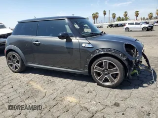 2012 MINI Hardtop S with VIN WMWSV3C53CTY29714, listed as a Copart auction lot 52370175 with 94,536 mi miles and Salvage title. Bid and sale history available at DreamBid. Image 4.