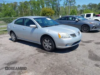 2006 Mitsubishi Galant ES z VIN 4A3AB36F66E076990, wystawiony jako IAAI lot #42042081 z przebiegiem 231 321 mil mil oraz . Historia ofert i sprzedaży dostępna na DreamBid. Obrazek 1.