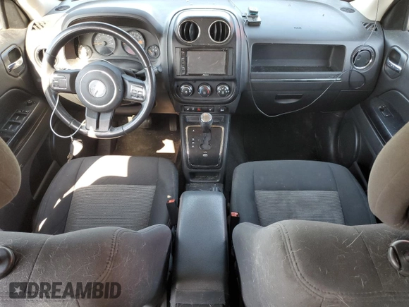 2015 Jeep Patriot Latitude with VIN 1C4NJPFB1FD157025, listed as a Copart auction lot 52310155 with 132,752 mi miles and Salvage title. Bid and sale history available at DreamBid. Image 8.
