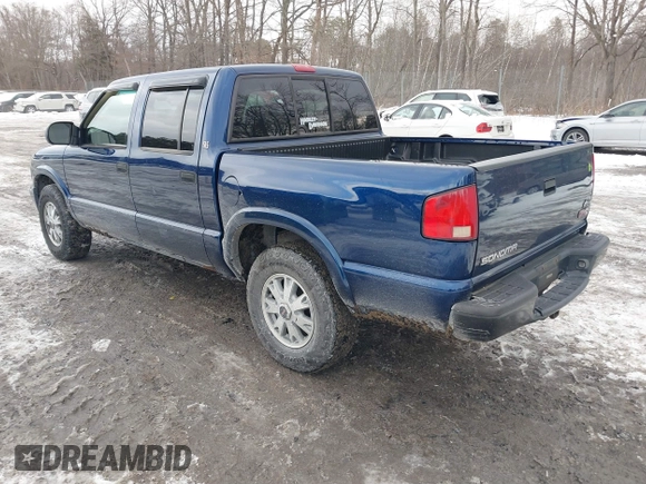 2002 GMC Sonoma SLS with VIN 1GTDT13W12K158613, listed as a IAAI auction lot 41524710 with 217,785 mi miles. Bid and sale history available at carsss.com. Image 3.