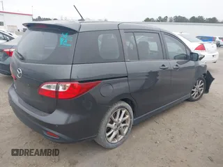 2013 Mazda 5 Touring with VIN JM1CW2CL2D0160917, listed as a IAAI auction lot 41621798 with 135,607 mi miles. Bid and sale history available at carsss.com. Image 4.