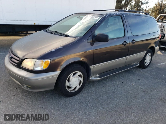2002 Toyota Sienna LE with VIN 4T3ZF13CX2U457768, listed as a Copart auction lot 84763284 with 195,268 mi miles and Salvage Title. Bid and sale history available at DreamBid. Image 1.