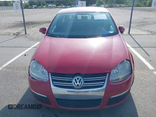2010 Volkswagen Jetta Sedan S with VIN 3VWJZ7AJ9AM053897, listed as a IAAI auction lot 40300970 with 249,537 mi miles. Bid and sale history available at carsss.com. Image 6.