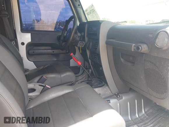 2009 Jeep Wrangler X with VIN 1J4FA24189L755392, listed as a IAAI auction lot 42176130 with 97,644 mi miles and . Bid and sale history available at DreamBid. Image 5.