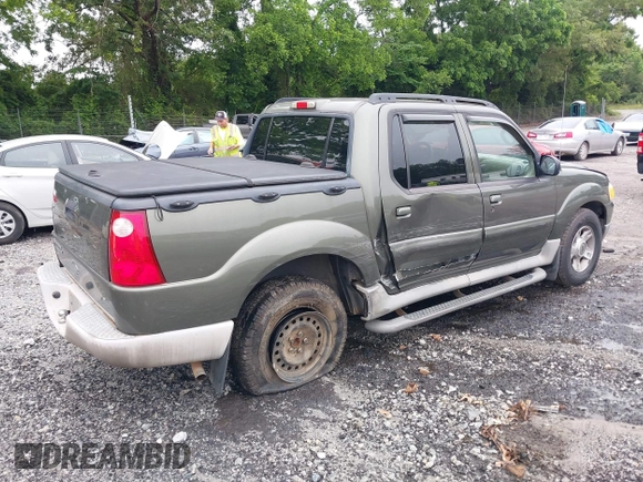 2003 Ford Explorer Sport Trac XLS with VIN 1FMZU67E03UB99141, listed as a IAAI auction lot 42323864 with 220,625 mi miles and . Bid and sale history available at DreamBid. Image 4.