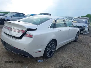 2019 Lincoln MKZ Reserve II z VIN 3LN6L5E94KR607412, wystawiony jako IAAI lot #42231994 z przebiegiem 54 812 mil mil oraz . Historia ofert i sprzedaży dostępna na DreamBid. Obrazek 4.