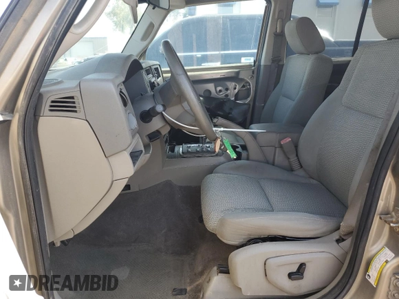 2006 Jeep Commander with VIN 1J8HG48K06C319278, listed as a Copart auction lot 60560225 with 122,920 mi miles and Salvage title. Bid and sale history available at DreamBid. Image 7.