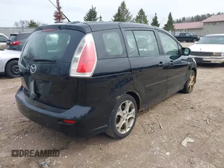2009 Mazda 5 Touring with VIN JM1CR29L990352678, listed as a IAAI auction lot 41939072 with 158,807 mi miles. Bid and sale history available at carsss.com. Image 4.