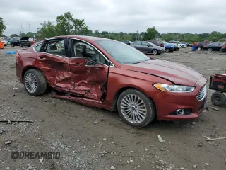 2014 Ford Fusion Titanium Hybrid with VIN 3FA6P0RU4ER387323, listed as a Copart auction lot 57107195 with Not provided miles and Salvage title. Bid and sale history available at DreamBid. Image 4.
